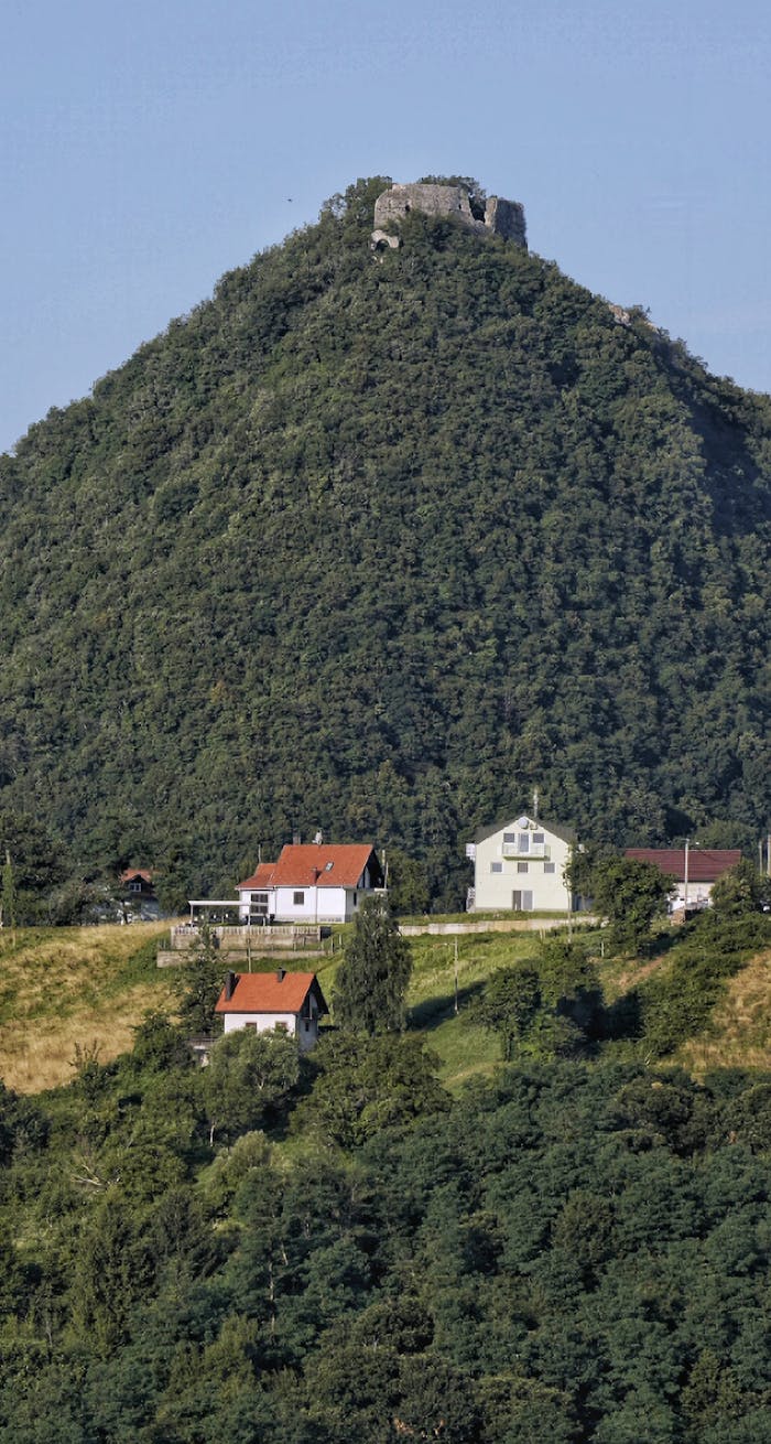 Explore a scenic view of a mountain with castle ruins in Samobor, Croatia.