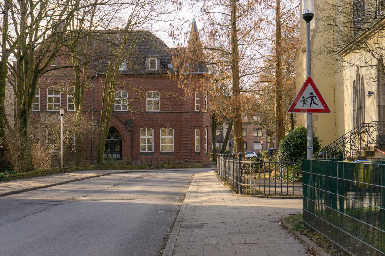 Historic street scene in Kamen, Germany with classic architecture and signage.